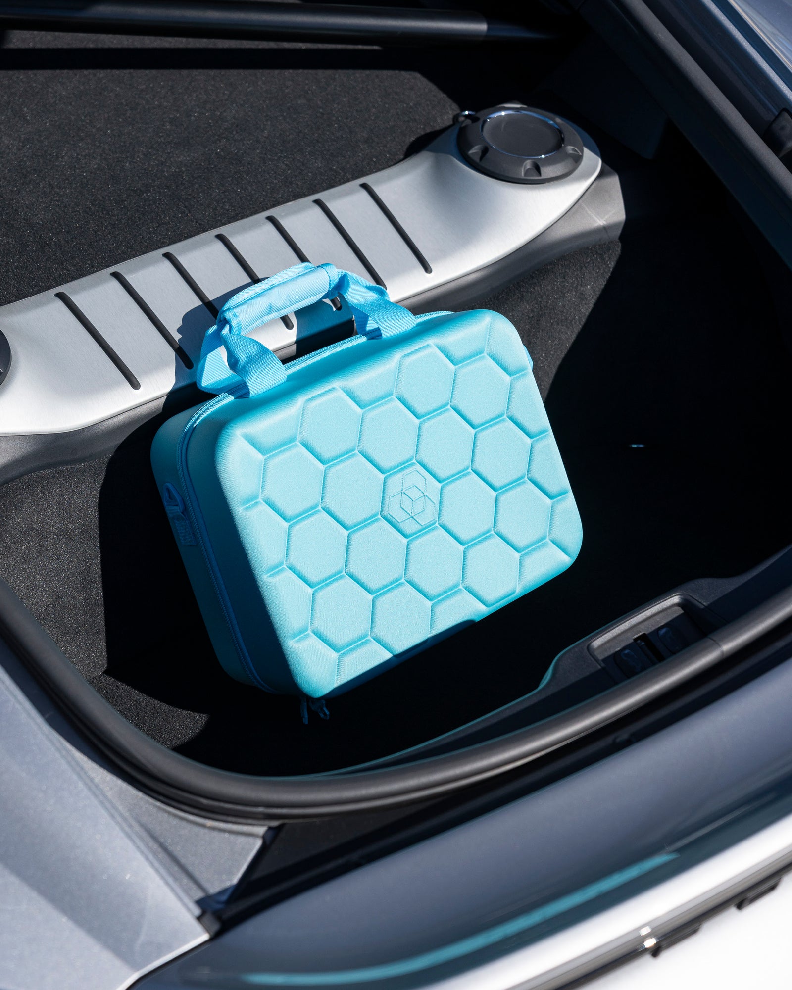 Carbon Collective Hard Case Detailing Carry Case (2025 Edition) with rugged EVA foam shell, storage for five 500ml bottles, microfiber towels, and accessories. Includes mesh and zippered pockets, padded handle, and limited edition Teal option.