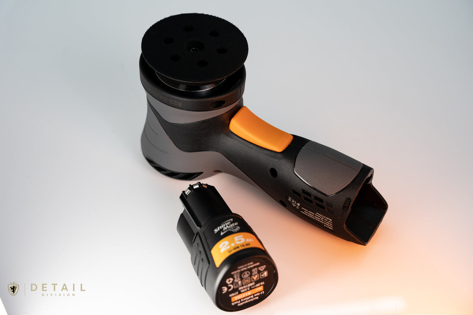 Car polisher with battery on a white background