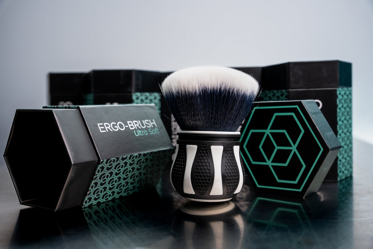 Carbon Collective Ultra Soft Ergo Detailing Brush with ultra-soft synthetic bristles and a non-slip hexagonal grip. Safe for delicate surfaces like gloss black trim, interiors, and exteriors, usable wet or dry.