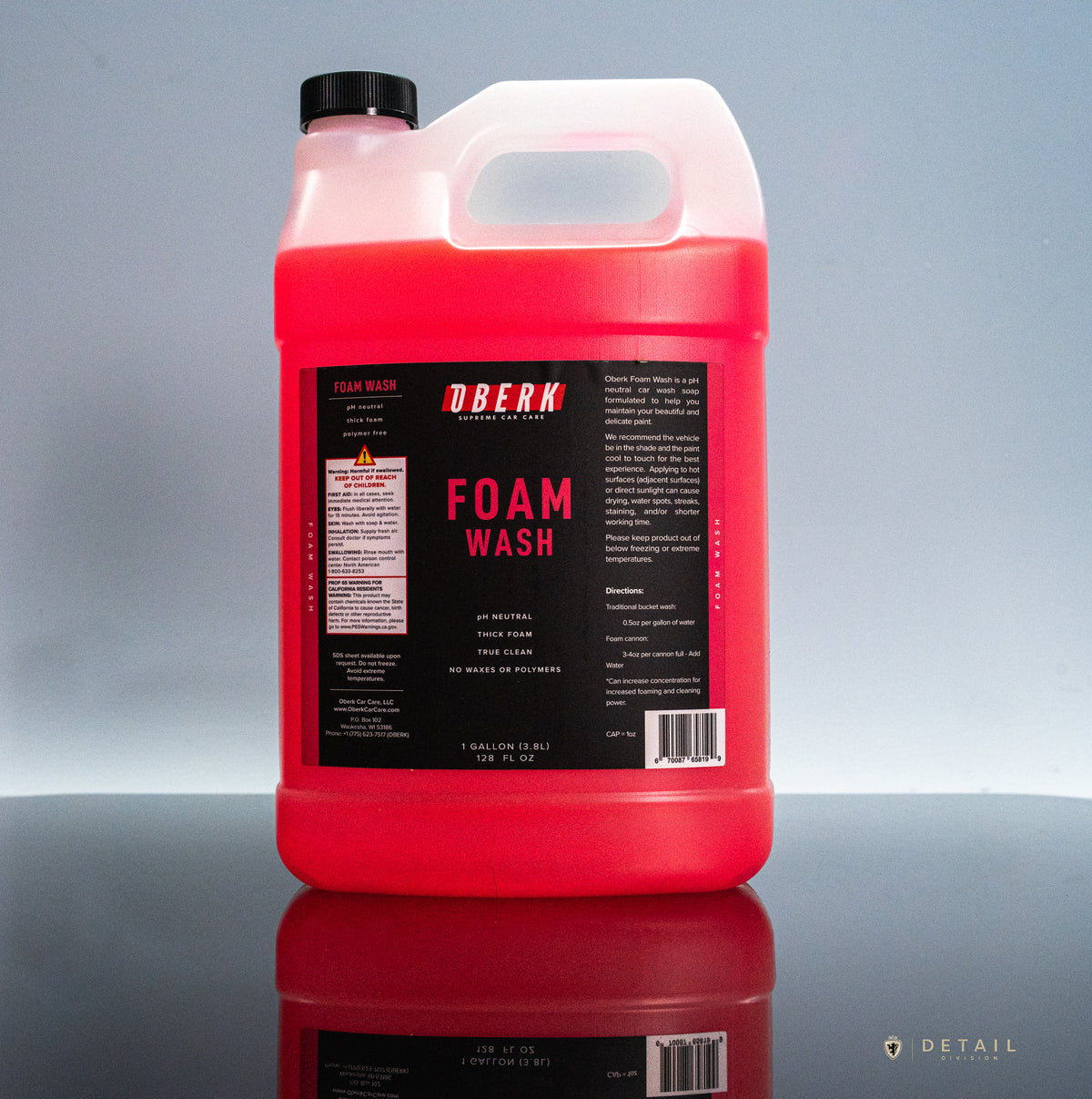 Red container of Oberk Foam Wash on a reflective surface with a gray background Gallon